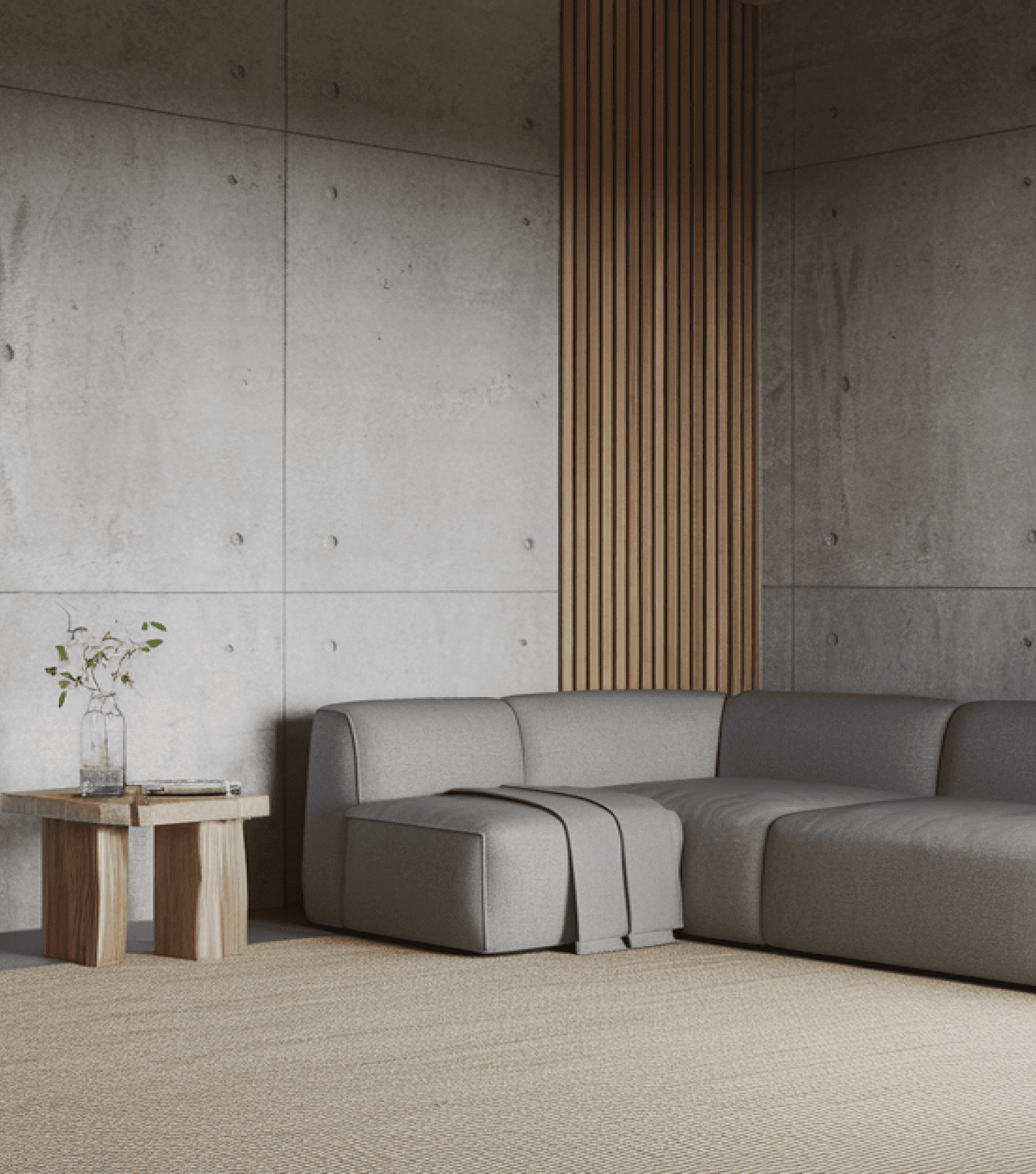 Sala de estar com sofá de canto cinzento-escuro e mesa de centro